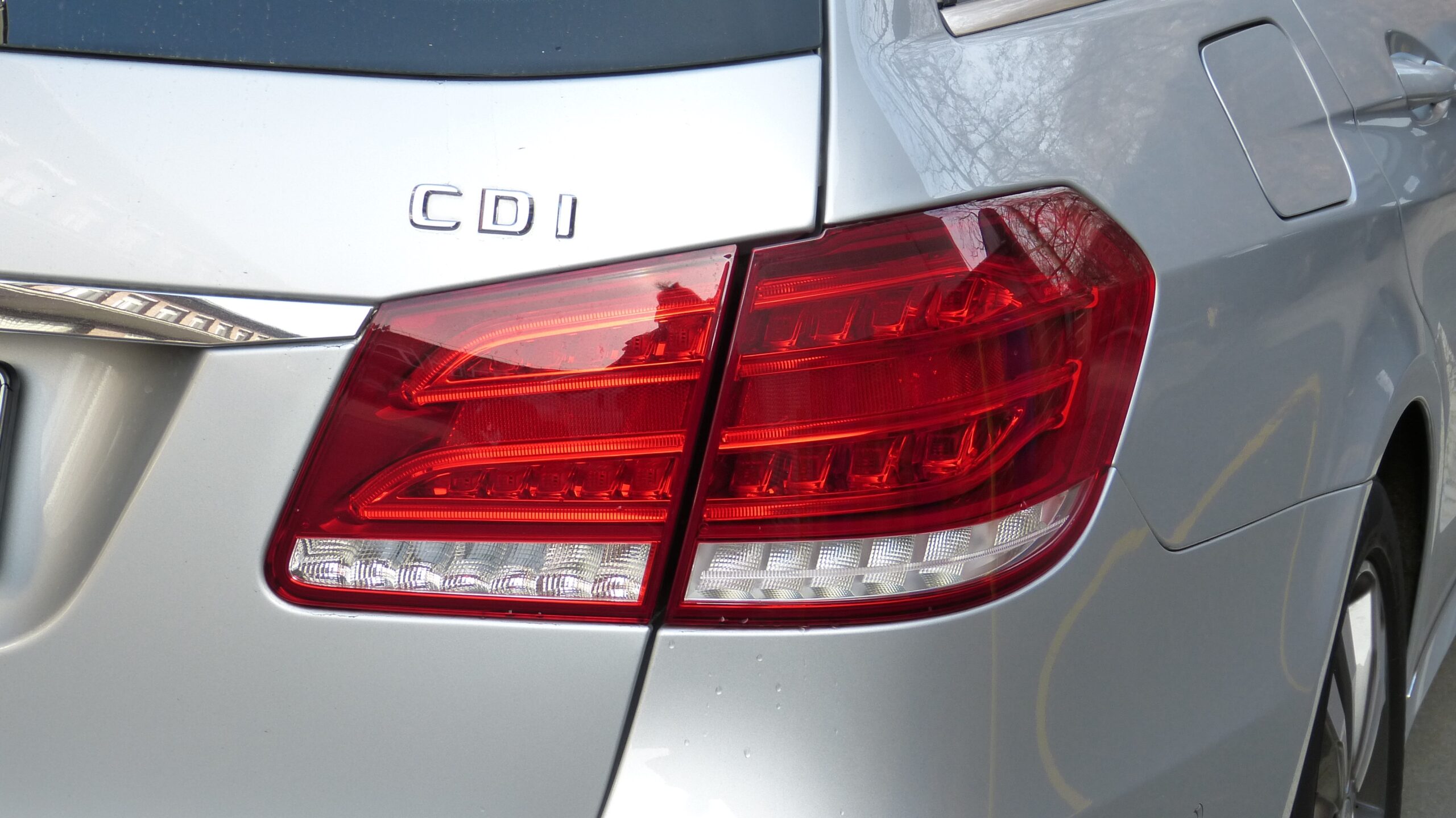 Back of the shiny, grey Mercedes E-class car (Science and Technology) auto,back light,mercedes,e-class,back view,shiny,grey,light