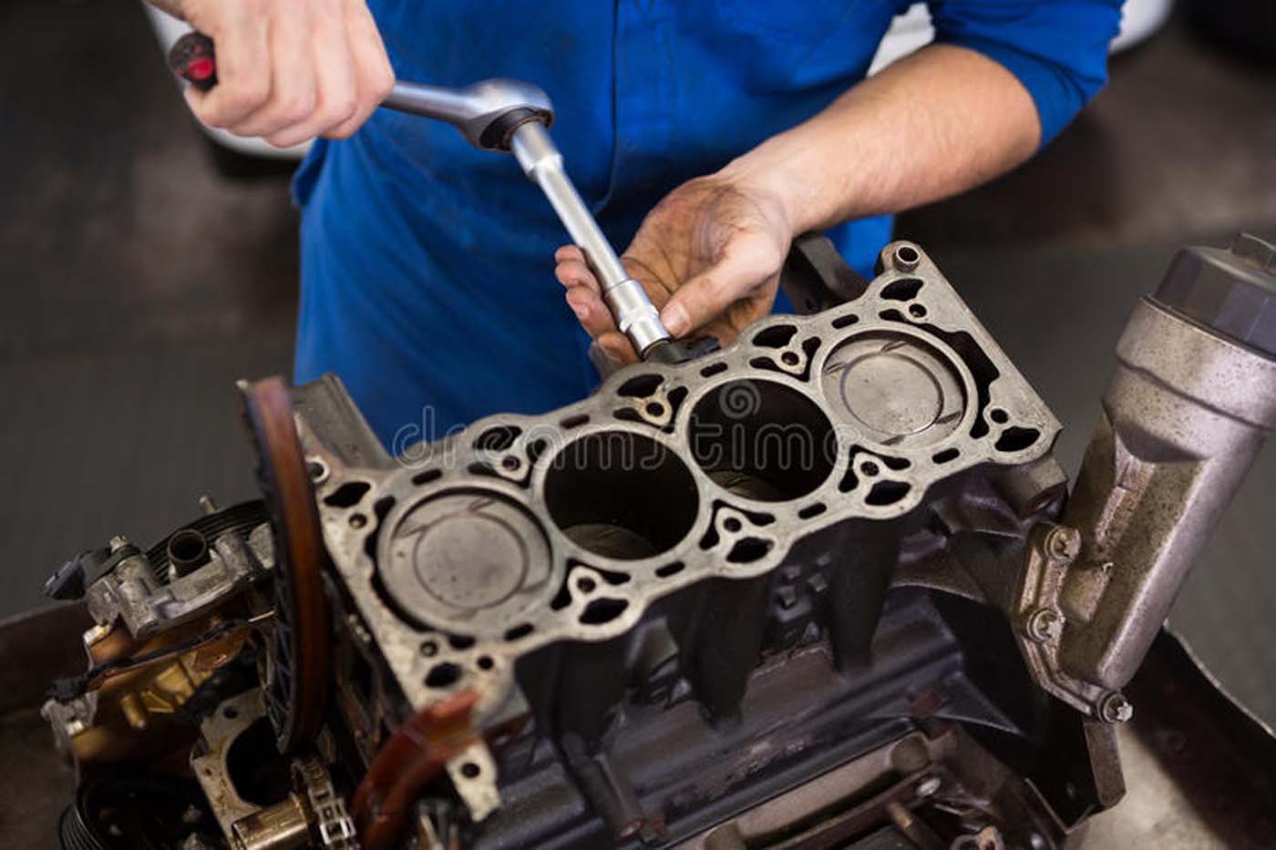 mechanic-working-engine-repair-garage-49278555